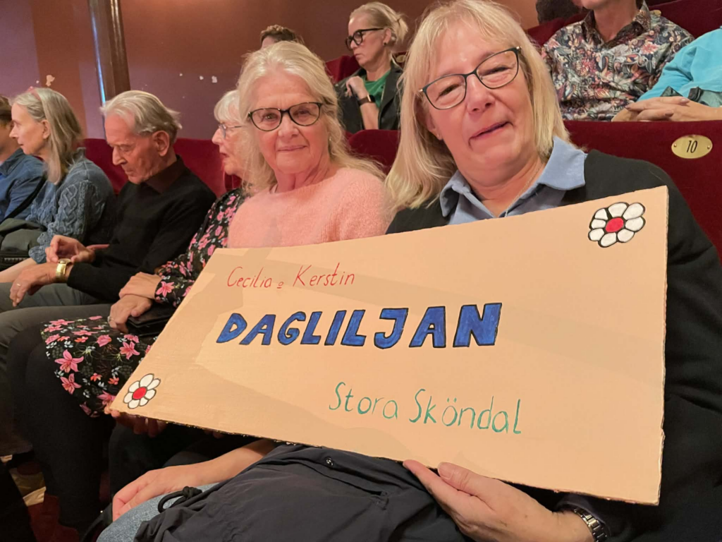 medarbetare från dagliljan i publiken